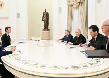 Vladimir Putin at Kremlin meeting on Ukraine talks - Kristina Kormilitsyna/Reuters/CNN