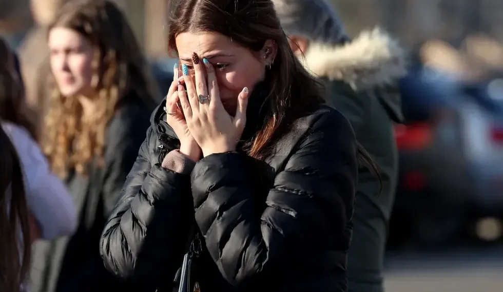 Police vehicles outside Pawtucket hockey arena after shooting - AP Photo/Mark Stockwell