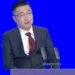 Xu Yangtian speaking at Guangdong development conference - Guangdong News/BBC