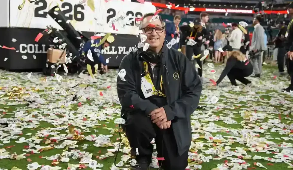 Confetti falling over players celebrating on Super Bowl field - AP Photo/Rebecca Blackwell
