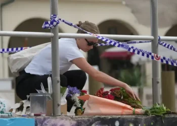Police secure Bondi Beach after Hanukkah attack - AP Photo/Mark Baker