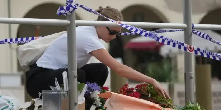 Police secure Bondi Beach after Hanukkah attack - AP Photo/Mark Baker