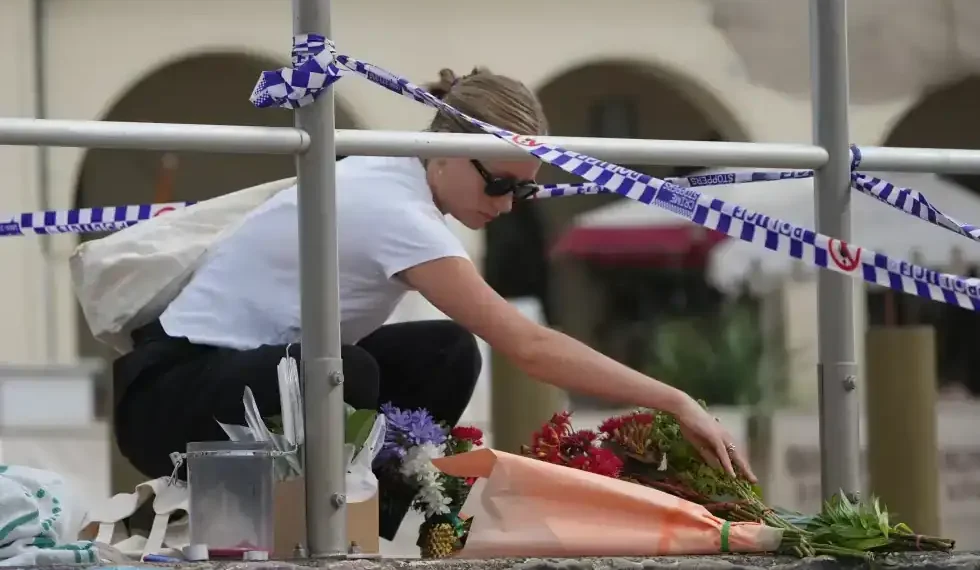 Police secure Bondi Beach after Hanukkah attack - AP Photo/Mark Baker