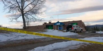Police vehicles surround Tumbler Ridge school after deadly shooting - Jesse Boily /The Canadian Press via AP