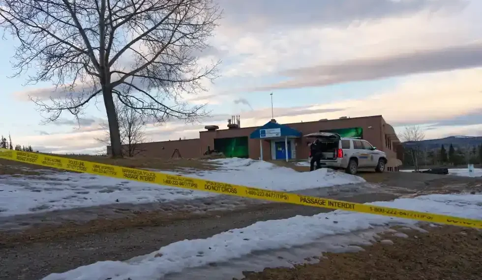 Police vehicles surround Tumbler Ridge school after deadly shooting - Jesse Boily /The Canadian Press via AP