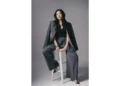 Vivian Tu discussing personal finance strategies online - Jenny Anderson via AP
