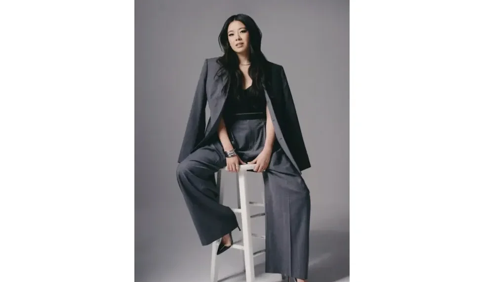 Vivian Tu discussing personal finance strategies online - Jenny Anderson via AP