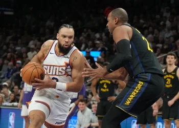 Gui Santos finishes fast break during Warriors comeback against Suns - AP Photo/Rick Scuteri
