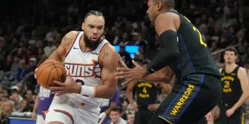 Gui Santos finishes fast break during Warriors comeback against Suns - AP Photo/Rick Scuteri