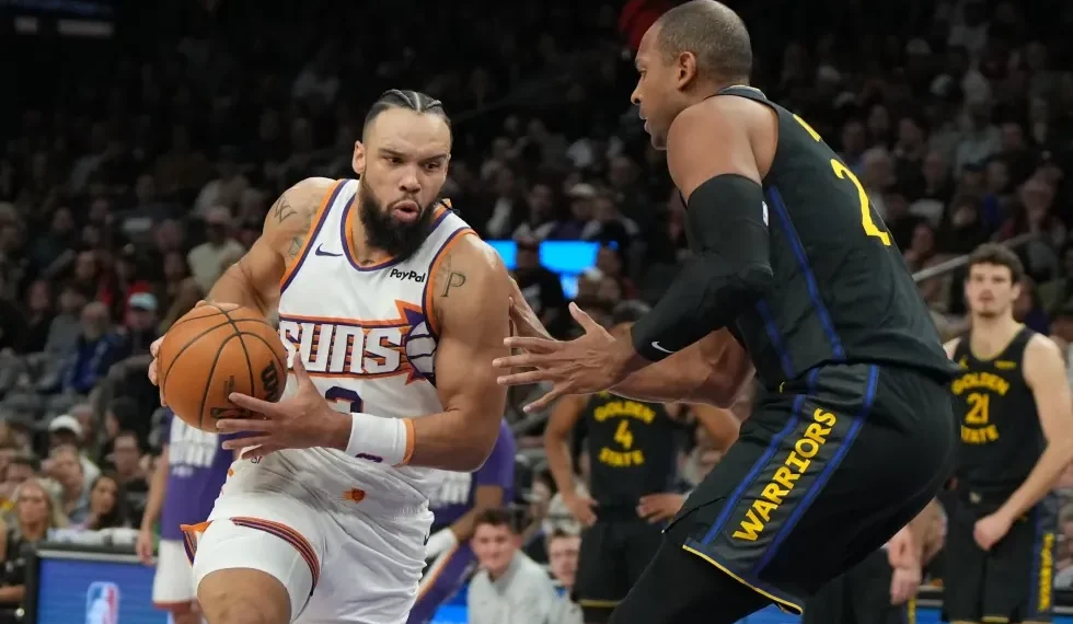 Gui Santos finishes fast break during Warriors comeback against Suns - AP Photo/Rick Scuteri