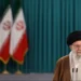 Iranian leaders’ portraits and Tehran skyline at sunset - Majid Asgaripour/Wana News Agency/Reuters