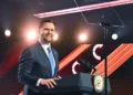 JD Vance speaking at Turning Point USA AmericaFest event - Jon Cherry/AP News