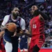 Andre Drummond reacts after three-pointer against Sacramento Kings bench - AP Photo/Matt Rourke