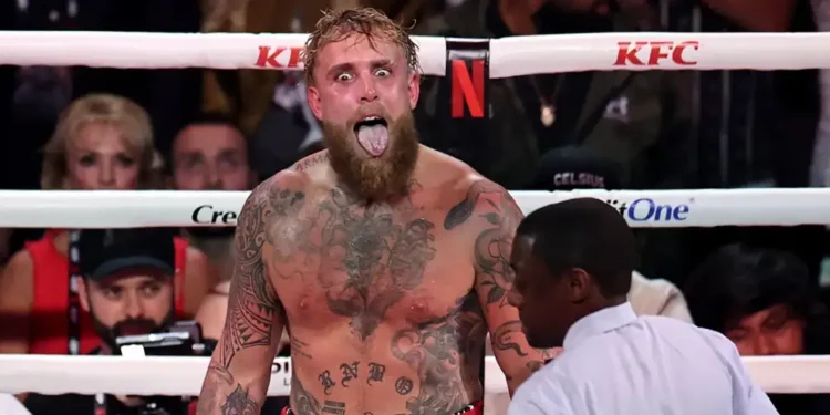 Anthony Joshua knocking down Jake Paul during sixth round finish - Photo by Carmen Mandato/Getty Images for Netflix