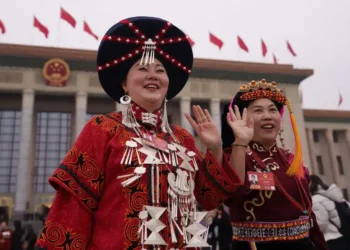 Chinese legislature debates ethnic unity law affecting minority language rights - AP Photo/Vincent Thian, File