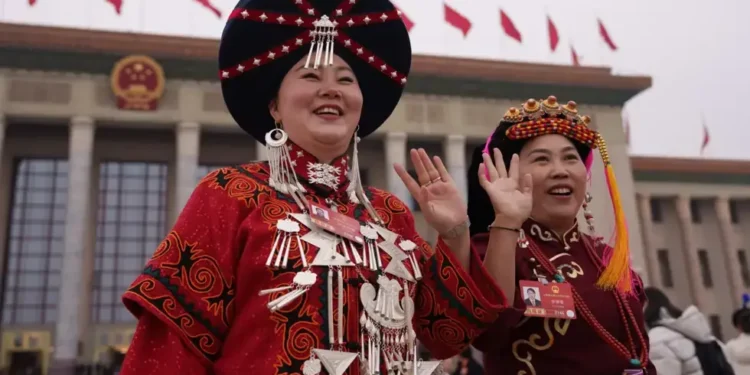 Chinese legislature debates ethnic unity law affecting minority language rights - AP Photo/Vincent Thian, File