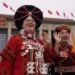 Chinese legislature debates ethnic unity law affecting minority language rights - AP Photo/Vincent Thian, File