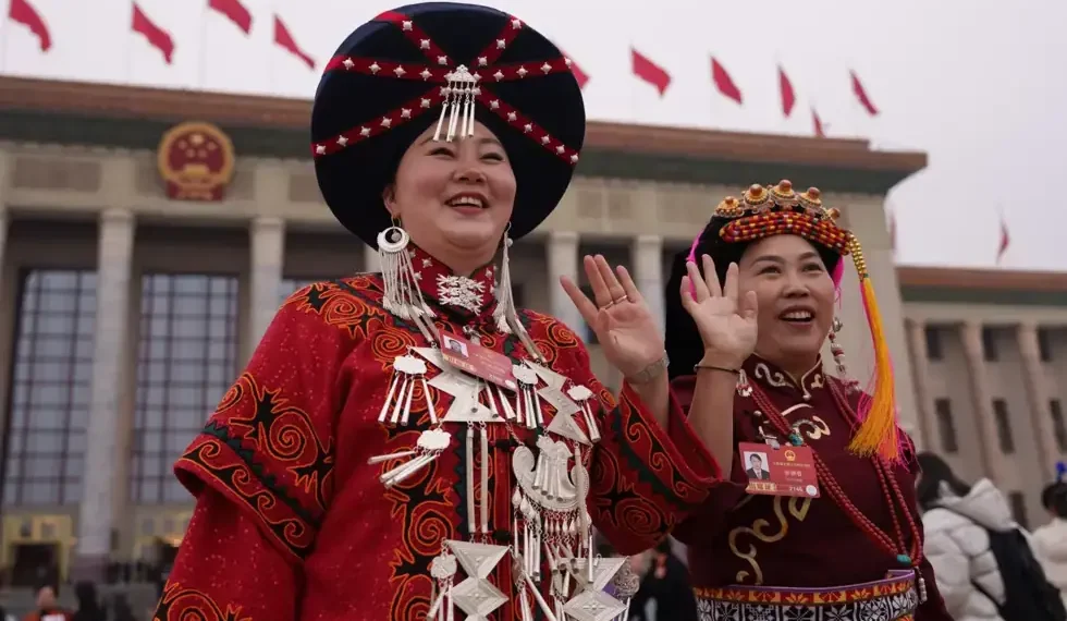 Chinese legislature debates ethnic unity law affecting minority language rights - AP Photo/Vincent Thian, File