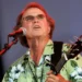 Country Joe McDonald performing anti-war anthem at Woodstock festival - AP Photo/Craig Ruttle, File