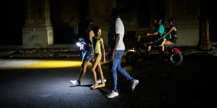 Darkened Havana skyline during nationwide Cuba power grid collapse - AP Photo/Ramon Espinosa