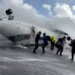 Overturned Delta regional jet on Toronto runway after landing failure - Peter Koukov/Handout/Reuters