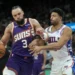 Dillon Brooks during Phoenix Suns game, injured hand visible - AP Photo/Ross D. Franklin