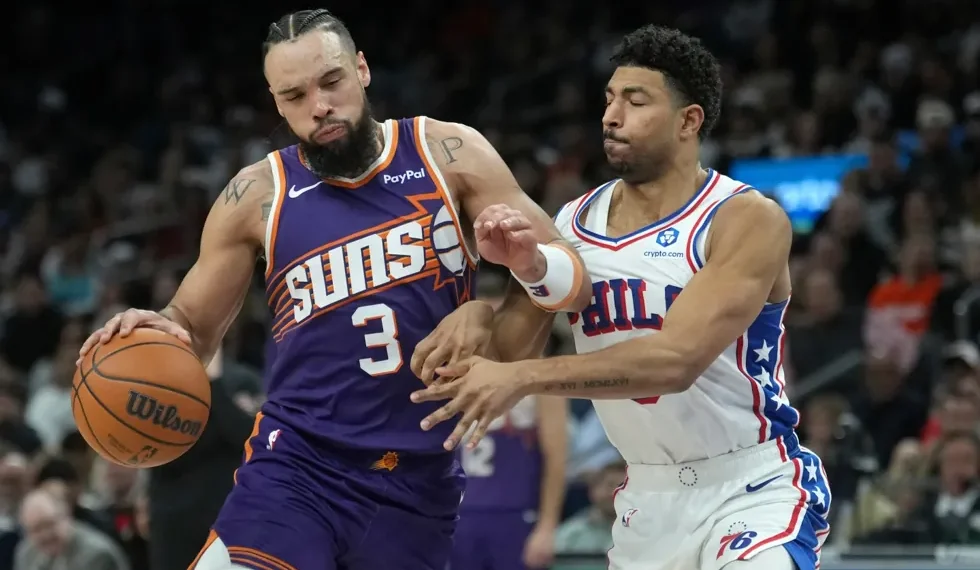 Dillon Brooks during Phoenix Suns game, injured hand visible - AP Photo/Ross D. Franklin
