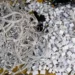 Discarded electronics and devices in e-waste recycling facility processing area - AP Photo/Jae C. Hong, File