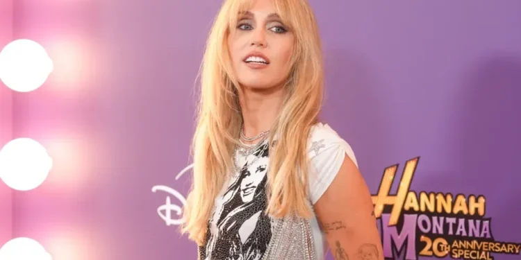Miley Cyrus at Hannah Montana anniversary special premiere event - AP Photo/Chris Pizzello