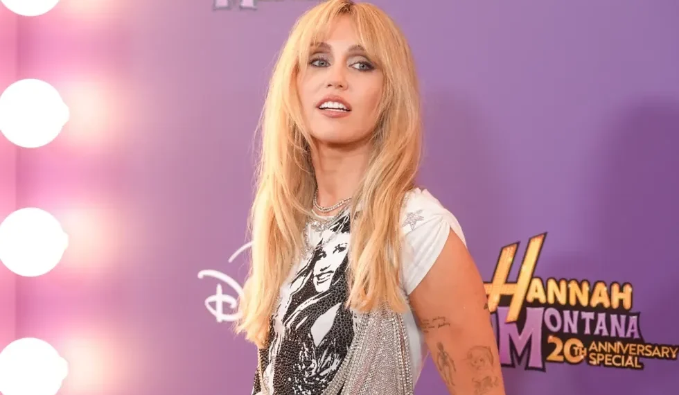 Miley Cyrus at Hannah Montana anniversary special premiere event - AP Photo/Chris Pizzello