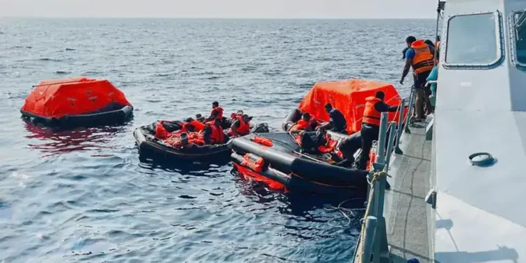 Iranian warship IRIS Dena sinking after submarine torpedo strike in Indian Ocean - Sri Lankan, Presidential Media Division via AP