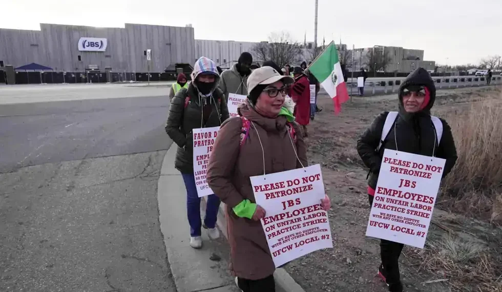 Workers picket outside JBS Swift beef plant during Colorado strike - AP Photo/Brittany Peterson