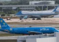 JetBlue aircraft parked at airport during temporary FAA ground stop - AP Photo/Manuel Balce Ceneta, File