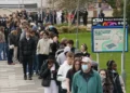 Students gather on campus amid meningitis outbreak response in Kent England - Gareth Fuller/PA via AP