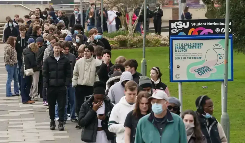 Students gather on campus amid meningitis outbreak response in Kent England - Gareth Fuller/PA via AP