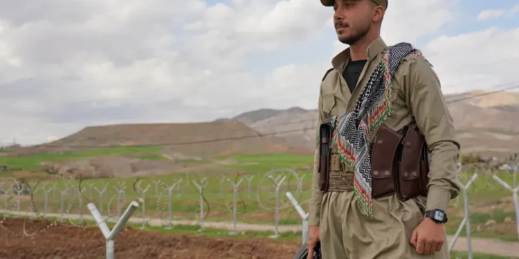 Kurdish opposition fighters near Iran border preparing for possible cross-border operations - AP Photo/Rashid Yahya