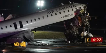 Damaged Air Canada regional jet after runway collision at LaGuardia Airport - AP Photo/Ryan Murphy