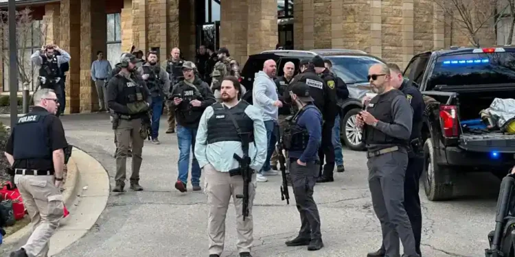 Police and emergency crews respond outside Temple Israel after Michigan synagogue attack - AP Photo/Corey Williams