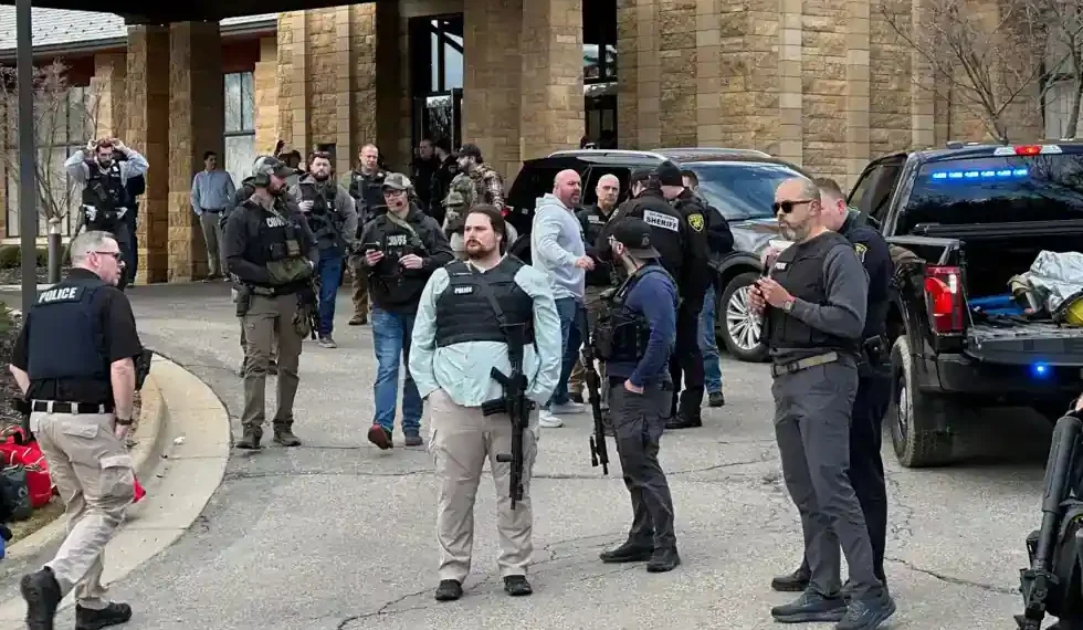 Police and emergency crews respond outside Temple Israel after Michigan synagogue attack - AP Photo/Corey Williams