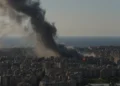 Smoke rises near Gulf oil facility after missile strike- (AP Photo/Hassan Ammar)