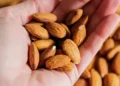 Selection of nutrient-dense leafy greens nuts and seeds - Credit: Getty Images