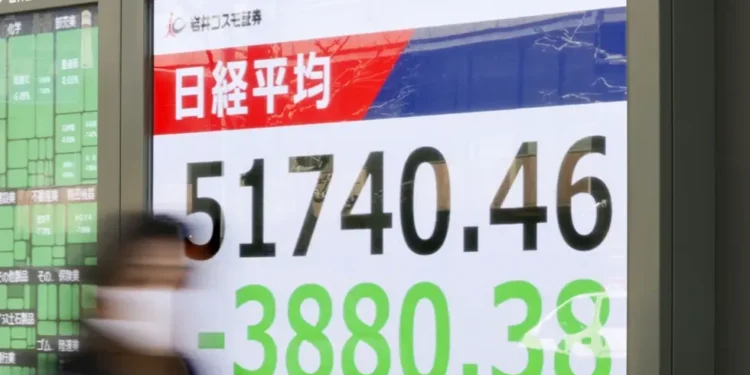Oil price surge above $110 affecting global stock markets and energy supply concerns - Kyodo News via AP