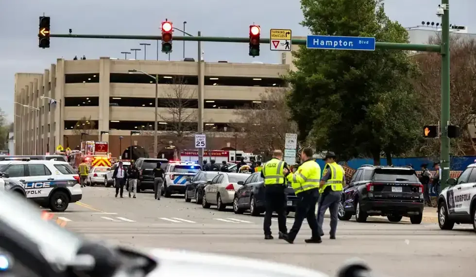 Police vehicles and emergency responders outside Old Dominion University after campus shooting - Kendall Warner/The Virginian-Pilot via AP