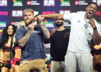 Jake Paul and Anthony Joshua facing off at Miami heavyweight weigh-in - AP Photo/Lynne Sladky