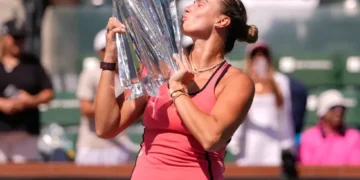 Jannik Sinner and Aryna Sabalenka celebrate Indian Wells tennis titles - AP Photo/Mark J. Terrill
