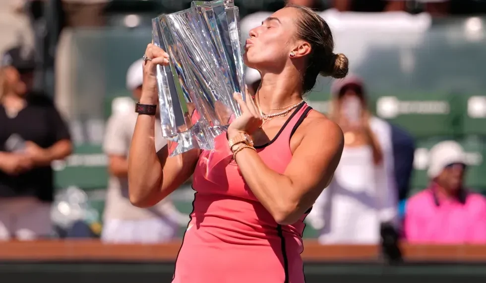 Jannik Sinner and Aryna Sabalenka celebrate Indian Wells tennis titles - AP Photo/Mark J. Terrill