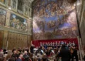 Choir performs during private Sistine Chapel concert beneath Michelangelo frescoes - AP Photo/Domenico Stinellis