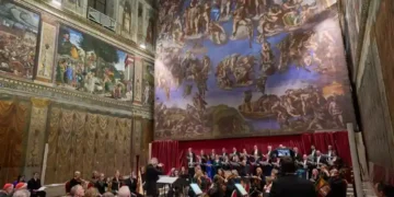 Choir performs during private Sistine Chapel concert beneath Michelangelo frescoes - AP Photo/Domenico Stinellis