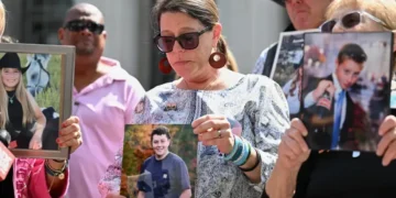 Social media apps Instagram and YouTube displayed on smartphone screen - AP Photo/William Liang