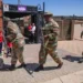 South African soldiers patrol Johannesburg streets during organized crime crackdown - AP Photo/Themba Hadebe